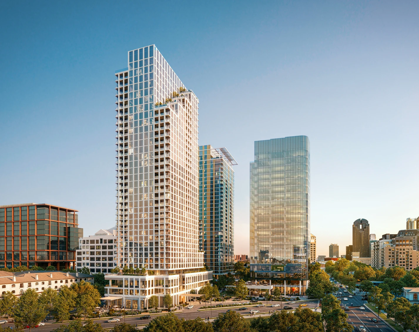 Modern high-rise towers dominate the skyline in Cedar Springs District during golden hour