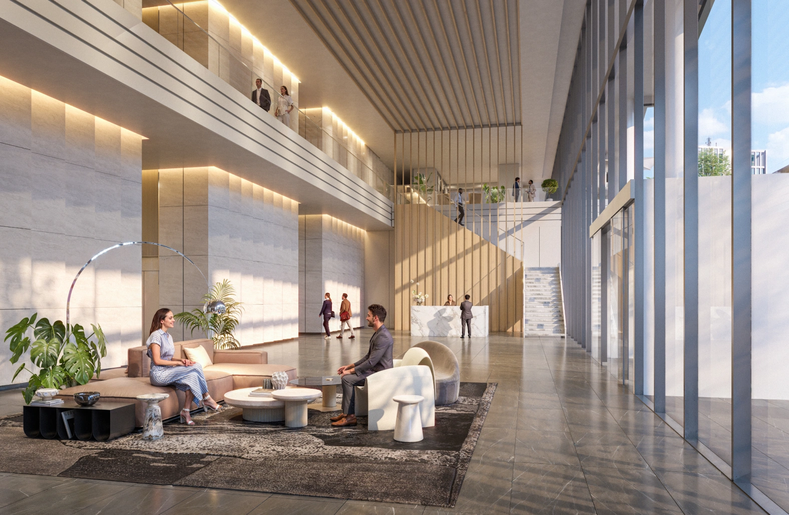 Corporate office entrance with grand staircase glass walls and lounge area