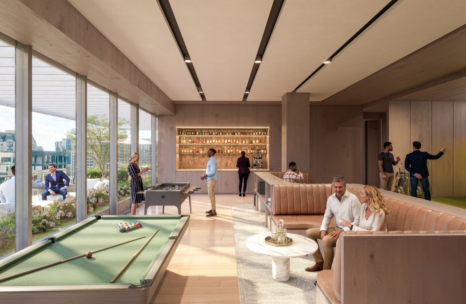Corporate amenity lounge with game tables private booths and outdoor patio