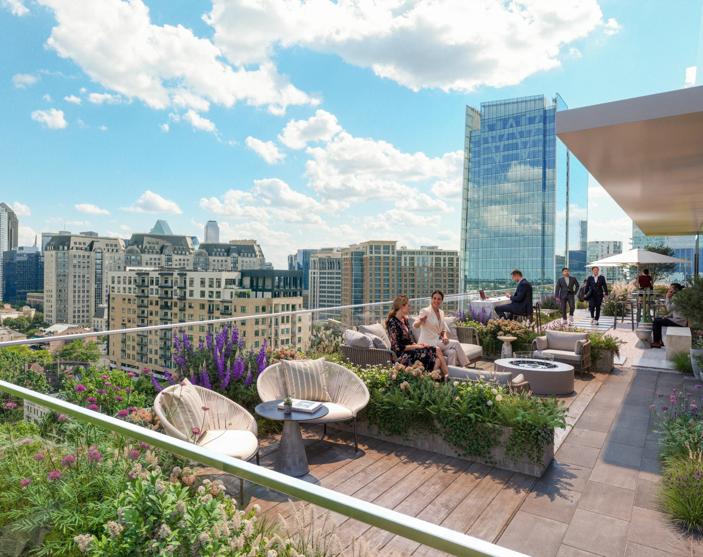 Office building rooftop patio with garden planters and panoramic views